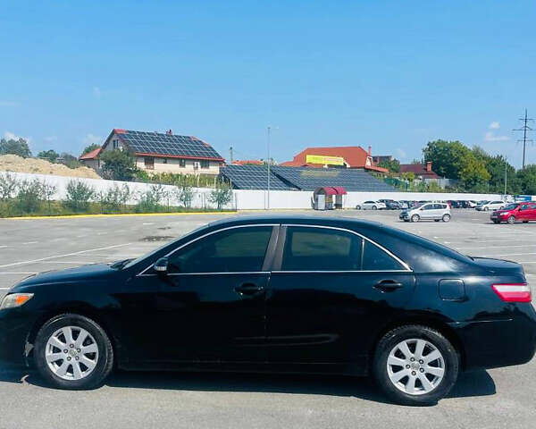 Черный Тойота Камри, объемом двигателя 2.36 л и пробегом 282 тыс. км за 7499 $, фото 1 на Automoto.ua