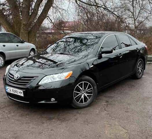 Черный Тойота Камри, объемом двигателя 3.5 л и пробегом 214 тыс. км за 12000 $, фото 1 на Automoto.ua