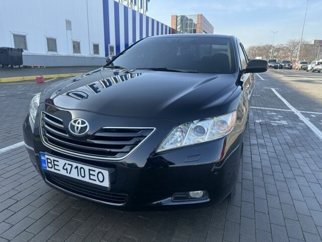 Черный Тойота Камри, объемом двигателя 2.4 л и пробегом 220 тыс. км за 8900 $, фото 1 на Automoto.ua
