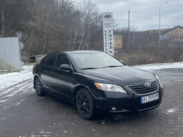 Черный Тойота Камри, объемом двигателя 3.5 л и пробегом 256 тыс. км за 8000 $, фото 1 на Automoto.ua