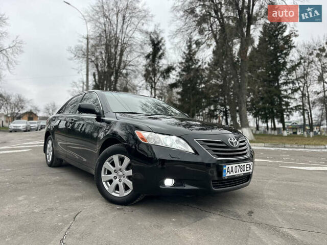 Черный Тойота Камри, объемом двигателя 2.4 л и пробегом 238 тыс. км за 8500 $, фото 1 на Automoto.ua