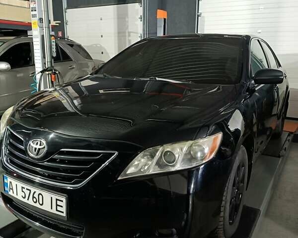 Черный Тойота Камри, объемом двигателя 3.46 л и пробегом 320 тыс. км за 8300 $, фото 1 на Automoto.ua