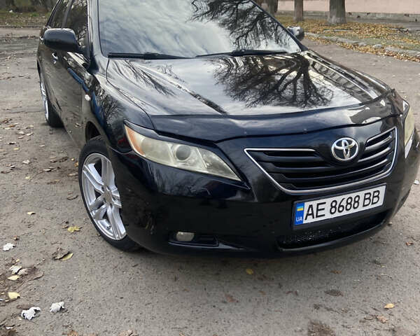 Черный Тойота Камри, объемом двигателя 3.46 л и пробегом 212 тыс. км за 9400 $, фото 1 на Automoto.ua