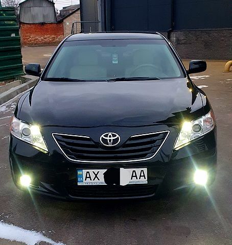 Черный Тойота Камри, объемом двигателя 2.4 л и пробегом 262 тыс. км за 7900 $, фото 1 на Automoto.ua