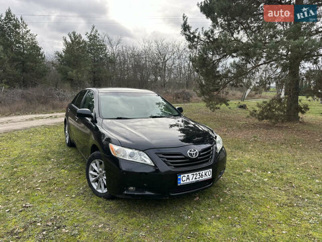 Черный Тойота Камри, объемом двигателя 2.36 л и пробегом 214 тыс. км за 7200 $, фото 1 на Automoto.ua