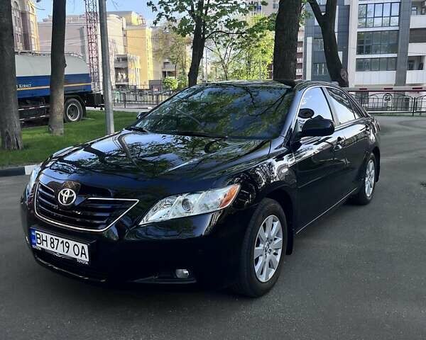 Черный Тойота Камри, объемом двигателя 2.36 л и пробегом 189 тыс. км за 12000 $, фото 1 на Automoto.ua