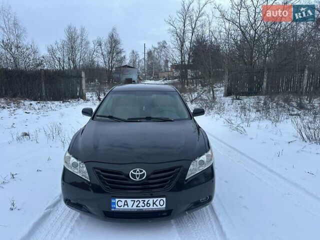 Черный Тойота Камри, объемом двигателя 2.36 л и пробегом 251 тыс. км за 7350 $, фото 1 на Automoto.ua