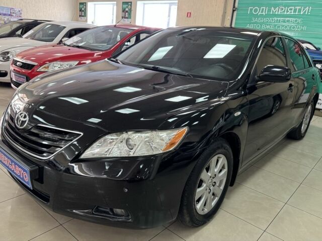 Черный Тойота Камри, объемом двигателя 2.4 л и пробегом 189 тыс. км за 7700 $, фото 1 на Automoto.ua
