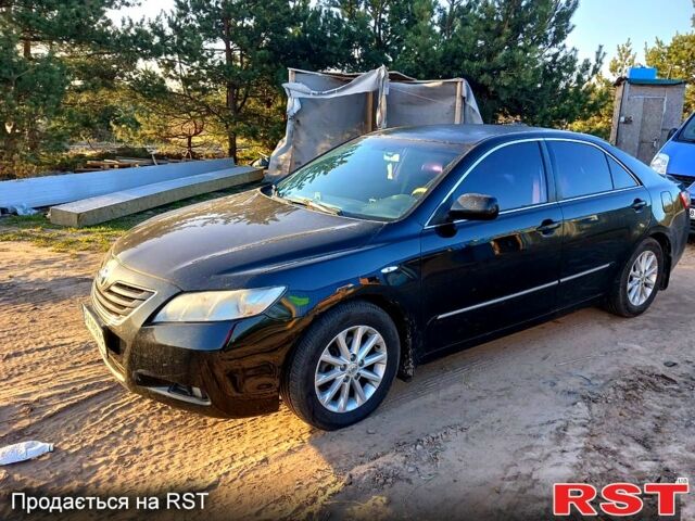 Черный Тойота Камри, объемом двигателя 2.4 л и пробегом 220 тыс. км за 8500 $, фото 1 на Automoto.ua