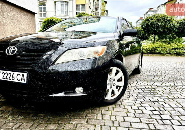 Черный Тойота Камри, объемом двигателя 2.36 л и пробегом 275 тыс. км за 8000 $, фото 1 на Automoto.ua