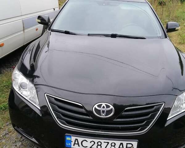 Черный Тойота Камри, объемом двигателя 2.36 л и пробегом 450 тыс. км за 8000 $, фото 1 на Automoto.ua
