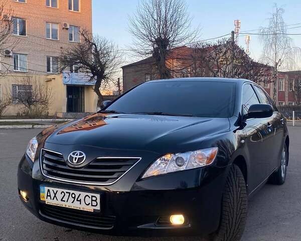 Черный Тойота Камри, объемом двигателя 2.4 л и пробегом 52 тыс. км за 13400 $, фото 1 на Automoto.ua