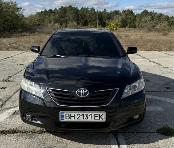 Черный Тойота Камри, объемом двигателя 2.4 л и пробегом 181 тыс. км за 8500 $, фото 1 на Automoto.ua