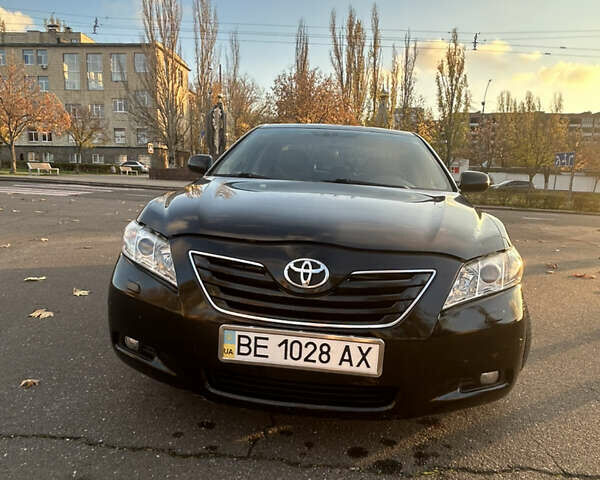 Черный Тойота Камри, объемом двигателя 2.4 л и пробегом 263 тыс. км за 8500 $, фото 1 на Automoto.ua