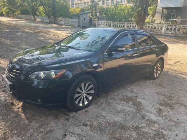Черный Тойота Камри, объемом двигателя 2.4 л и пробегом 282 тыс. км за 5000 $, фото 1 на Automoto.ua
