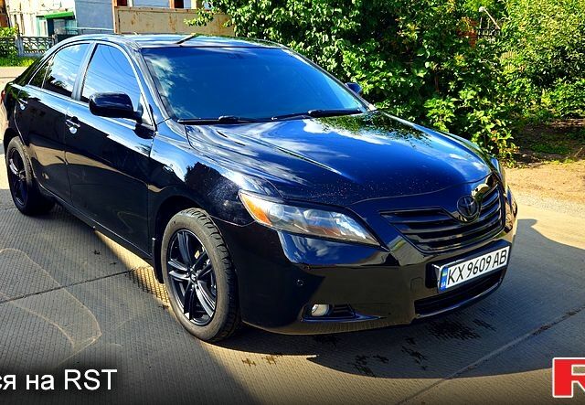 Черный Тойота Камри, объемом двигателя 2.4 л и пробегом 233 тыс. км за 8500 $, фото 1 на Automoto.ua