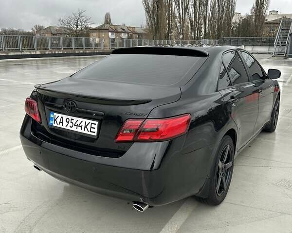 Черный Тойота Камри, объемом двигателя 3.46 л и пробегом 390 тыс. км за 11700 $, фото 1 на Automoto.ua