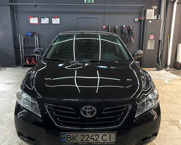 Черный Тойота Камри, объемом двигателя 2.36 л и пробегом 197 тыс. км за 9500 $, фото 1 на Automoto.ua