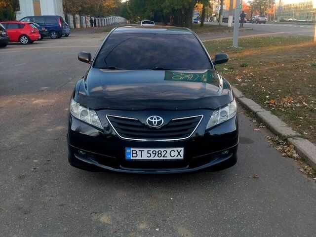 Черный Тойота Камри, объемом двигателя 2.4 л и пробегом 322 тыс. км за 7000 $, фото 1 на Automoto.ua