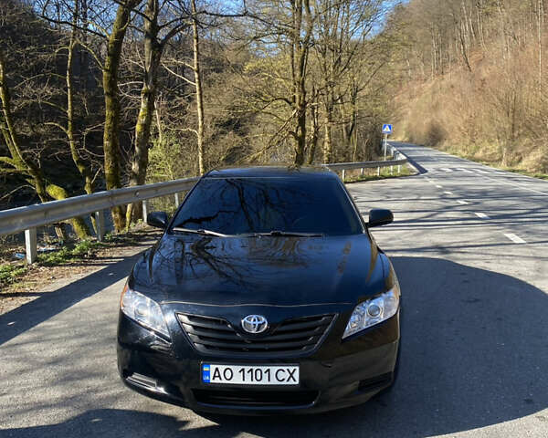 Черный Тойота Камри, объемом двигателя 2.36 л и пробегом 320 тыс. км за 7000 $, фото 1 на Automoto.ua