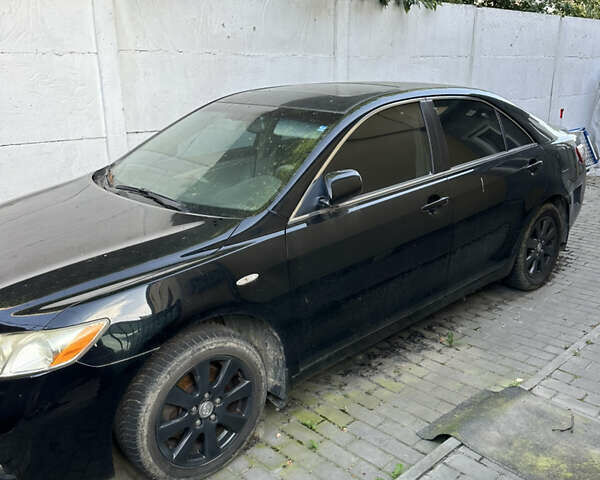 Чорний Тойота Камрі, об'ємом двигуна 2.36 л та пробігом 340 тис. км за 10500 $, фото 1 на Automoto.ua