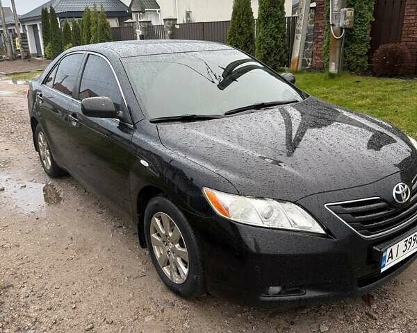 Черный Тойота Камри, объемом двигателя 2.36 л и пробегом 316 тыс. км за 8800 $, фото 1 на Automoto.ua