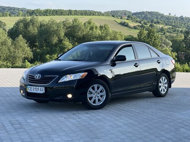 Черный Тойота Камри, объемом двигателя 2.4 л и пробегом 90 тыс. км за 9500 $, фото 1 на Automoto.ua