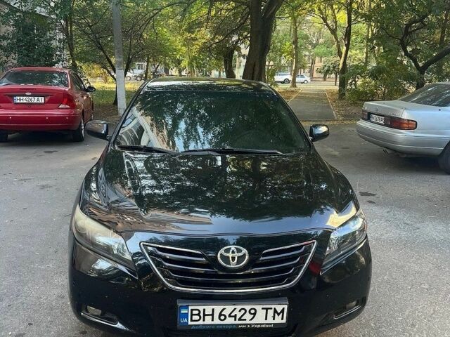 Черный Тойота Камри, объемом двигателя 2.4 л и пробегом 253 тыс. км за 8100 $, фото 1 на Automoto.ua