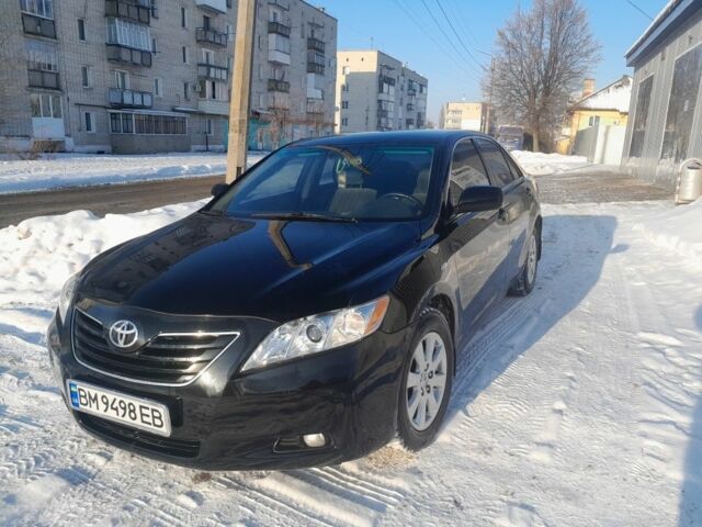 Черный Тойота Камри, объемом двигателя 2.4 л и пробегом 266 тыс. км за 7450 $, фото 1 на Automoto.ua