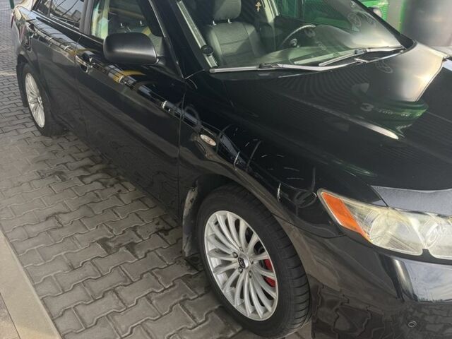 Черный Тойота Камри, объемом двигателя 2.4 л и пробегом 169 тыс. км за 8700 $, фото 1 на Automoto.ua