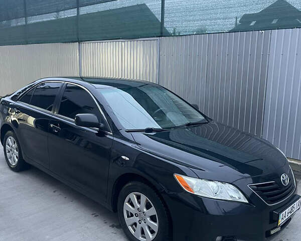Черный Тойота Камри, объемом двигателя 2.3 л и пробегом 275 тыс. км за 8000 $, фото 1 на Automoto.ua