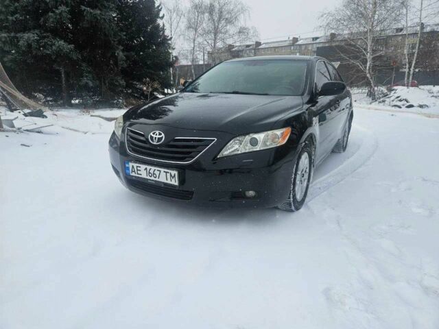 Чорний Тойота Камрі, об'ємом двигуна 2.4 л та пробігом 2 тис. км за 8000 $, фото 1 на Automoto.ua