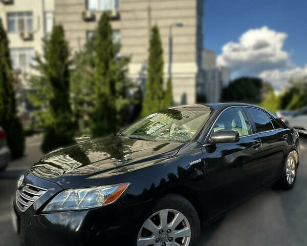 Черный Тойота Камри, объемом двигателя 2.4 л и пробегом 264 тыс. км за 9000 $, фото 1 на Automoto.ua