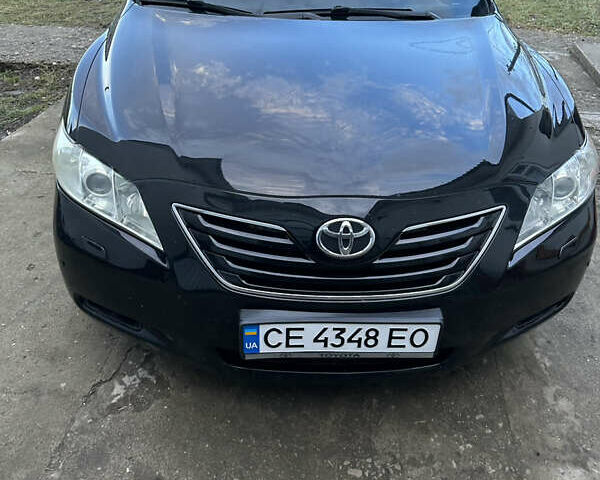 Черный Тойота Камри, объемом двигателя 2.36 л и пробегом 240 тыс. км за 9600 $, фото 1 на Automoto.ua