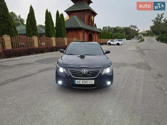 Черный Тойота Камри, объемом двигателя 2.4 л и пробегом 297 тыс. км за 7400 $, фото 1 на Automoto.ua
