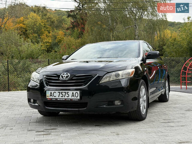 Черный Тойота Камри, объемом двигателя 3.5 л и пробегом 246 тыс. км за 11000 $, фото 1 на Automoto.ua