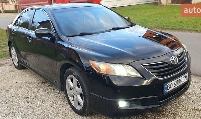 Черный Тойота Камри, объемом двигателя 2.4 л и пробегом 167 тыс. км за 8200 $, фото 1 на Automoto.ua