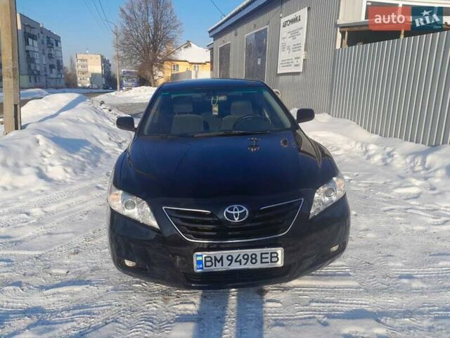 Черный Тойота Камри, объемом двигателя 2.4 л и пробегом 266 тыс. км за 7450 $, фото 1 на Automoto.ua