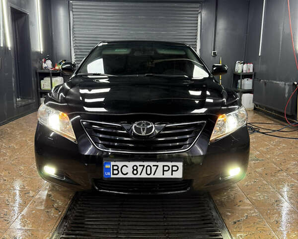 Чорний Тойота Камрі, об'ємом двигуна 2.36 л та пробігом 190 тис. км за 10500 $, фото 1 на Automoto.ua