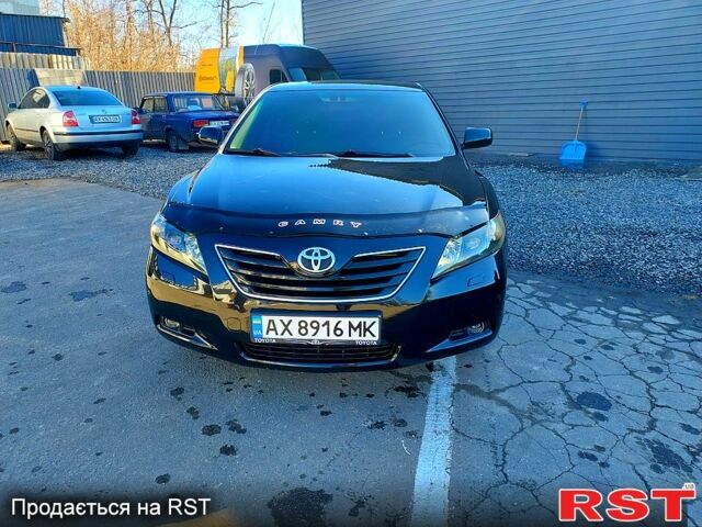 Черный Тойота Камри, объемом двигателя 2.4 л и пробегом 262 тыс. км за 8350 $, фото 1 на Automoto.ua