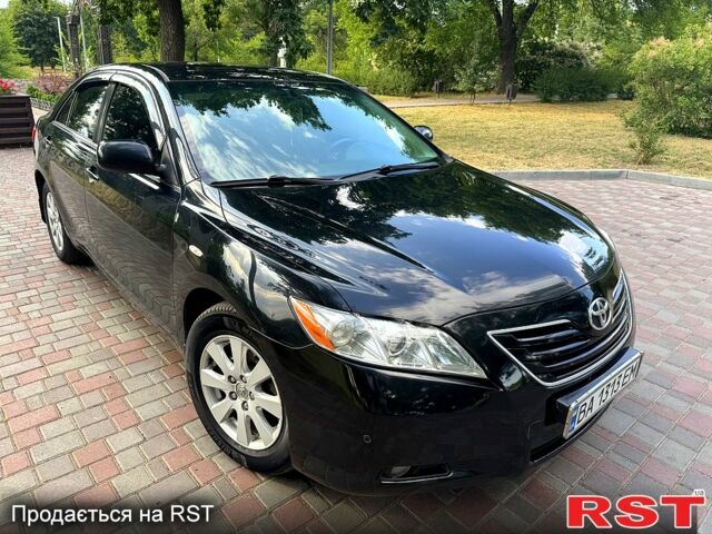 Чорний Тойота Камрі, об'ємом двигуна 2.4 л та пробігом 257 тис. км за 8300 $, фото 1 на Automoto.ua