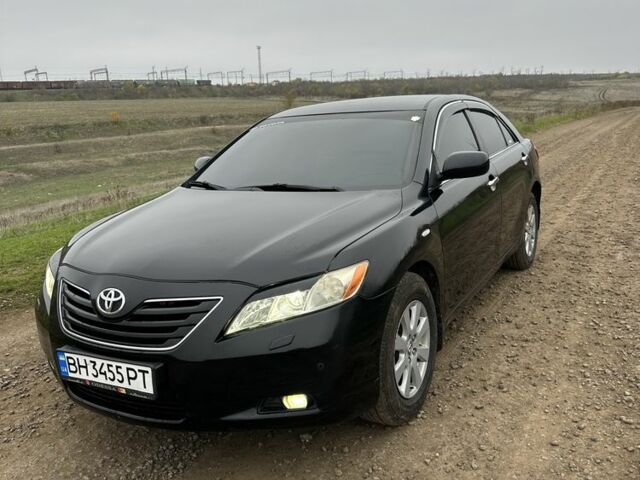 Черный Тойота Камри, объемом двигателя 2.4 л и пробегом 212 тыс. км за 8000 $, фото 1 на Automoto.ua