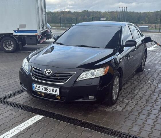 Черный Тойота Камри, объемом двигателя 3.5 л и пробегом 250 тыс. км за 10700 $, фото 1 на Automoto.ua