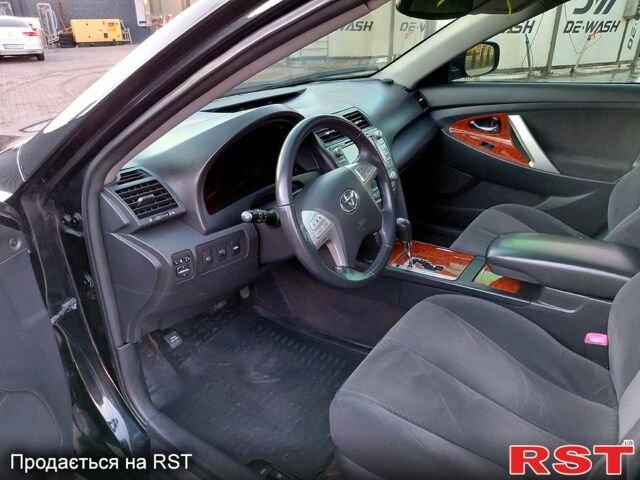 Черный Тойота Камри, объемом двигателя 2.4 л и пробегом 0 тыс. км за 7800 $, фото 1 на Automoto.ua