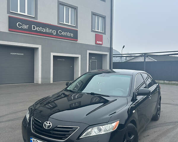 Черный Тойота Камри, объемом двигателя 3.46 л и пробегом 293 тыс. км за 9000 $, фото 1 на Automoto.ua