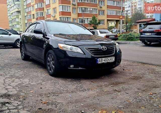 Черный Тойота Камри, объемом двигателя 2.36 л и пробегом 355 тыс. км за 7300 $, фото 1 на Automoto.ua