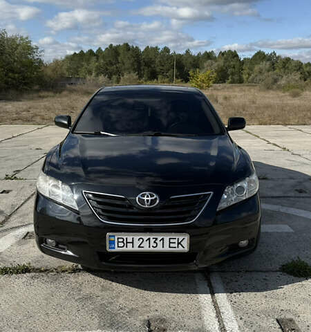 Чорний Тойота Камрі, об'ємом двигуна 2.4 л та пробігом 181 тис. км за 9000 $, фото 1 на Automoto.ua