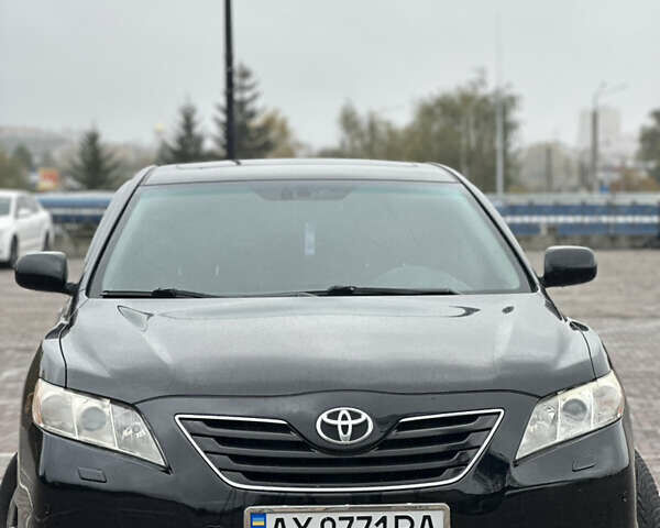 Черный Тойота Камри, объемом двигателя 3.5 л и пробегом 315 тыс. км за 8500 $, фото 1 на Automoto.ua
