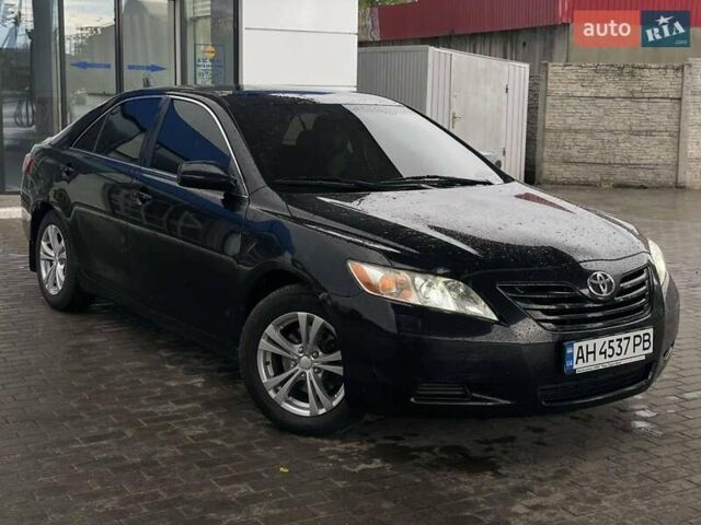 Черный Тойота Камри, объемом двигателя 2.36 л и пробегом 220 тыс. км за 8500 $, фото 1 на Automoto.ua