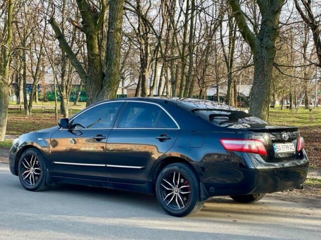 Черный Тойота Камри, объемом двигателя 2.4 л и пробегом 400 тыс. км за 7100 $, фото 1 на Automoto.ua